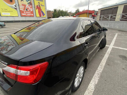 Черный Тойота Камри, объемом двигателя 2.49 л и пробегом 165 тыс. км за 15000 $, фото 1 на Automoto.ua
