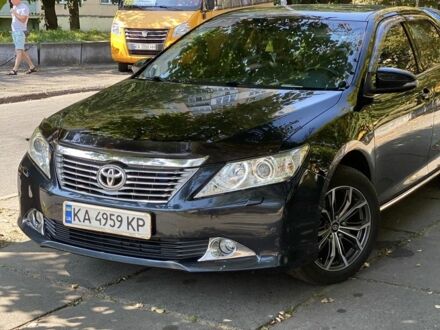 Черный Тойота Камри, объемом двигателя 2.5 л и пробегом 202 тыс. км за 14300 $, фото 1 на Automoto.ua