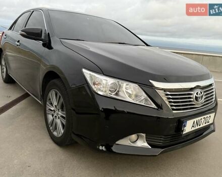 Черный Тойота Камри, объемом двигателя 2.49 л и пробегом 200 тыс. км за 10000 $, фото 1 на Automoto.ua