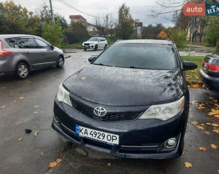 Черный Тойота Камри, объемом двигателя 2.5 л и пробегом 320 тыс. км за 9200 $, фото 1 на Automoto.ua