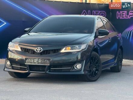 Чорний Тойота Камрі, об'ємом двигуна 2.49 л та пробігом 184 тис. км за 12499 $, фото 1 на Automoto.ua