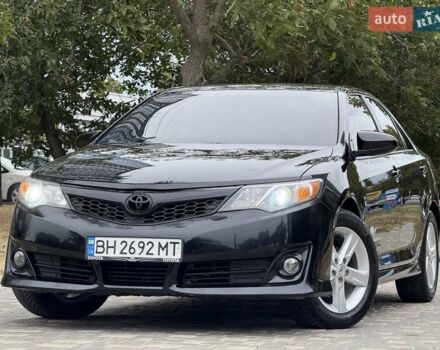 Чорний Тойота Камрі, об'ємом двигуна 2.5 л та пробігом 196 тис. км за 13600 $, фото 1 на Automoto.ua