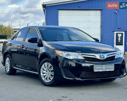 Черный Тойота Камри, объемом двигателя 2.49 л и пробегом 240 тыс. км за 10900 $, фото 1 на Automoto.ua