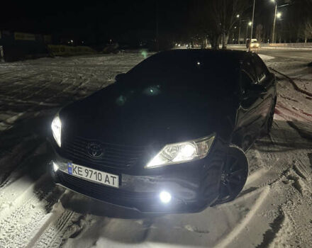 Чорний Тойота Камрі, об'ємом двигуна 2.5 л та пробігом 257 тис. км за 12400 $, фото 1 на Automoto.ua