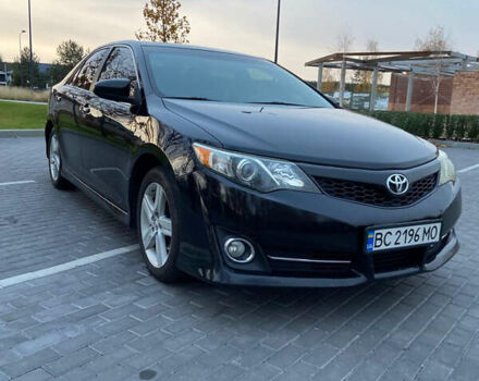 Чорний Тойота Камрі, об'ємом двигуна 2.49 л та пробігом 317 тис. км за 9500 $, фото 1 на Automoto.ua