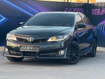 Тойота Камри 2013 в Запорожье на Automoto.ua Черный Тойота Камри, объемом двигателя 2.5 л и пробегом 184 тыс. км за 12499 $, фото 1 на Automoto.ua