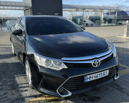 Черный Тойота Камри, объемом двигателя 2.49 л и пробегом 142 тыс. км за 13200 $, фото 1 на Automoto.ua