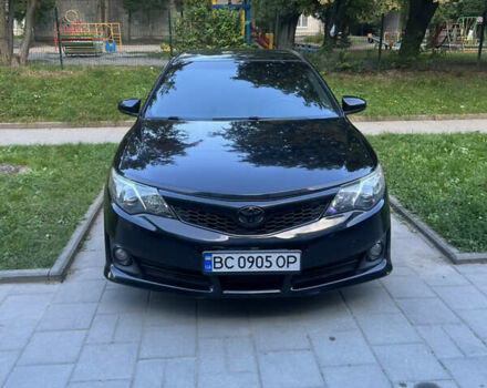 Чорний Тойота Камрі, об'ємом двигуна 2.5 л та пробігом 205 тис. км за 12500 $, фото 1 на Automoto.ua