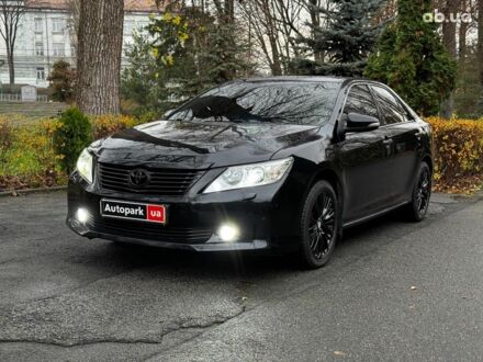 Черный Тойота Камри, объемом двигателя 2.5 л и пробегом 257 тыс. км за 13990 $, фото 1 на Automoto.ua