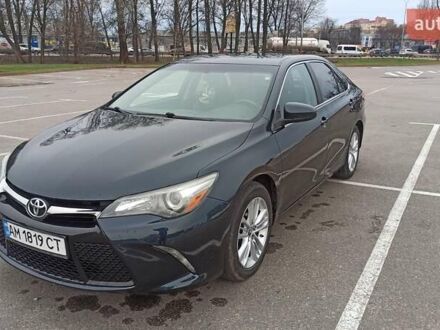 Черный Тойота Камри, объемом двигателя 2.49 л и пробегом 195 тыс. км за 12100 $, фото 1 на Automoto.ua