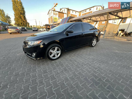Черный Тойота Камри, объемом двигателя 2.49 л и пробегом 290 тыс. км за 9600 $, фото 1 на Automoto.ua