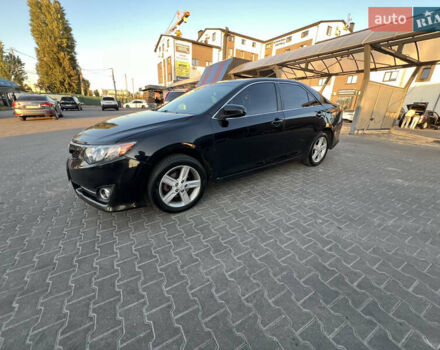 Чорний Тойота Камрі, об'ємом двигуна 2.49 л та пробігом 290 тис. км за 9600 $, фото 1 на Automoto.ua