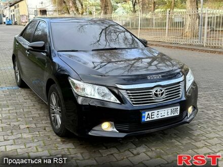 Черный Тойота Камри, объемом двигателя 2.5 л и пробегом 208 тыс. км за 9500 $, фото 1 на Automoto.ua