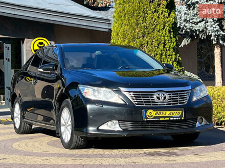 Черный Тойота Камри, объемом двигателя 2.49 л и пробегом 260 тыс. км за 13750 $, фото 1 на Automoto.ua