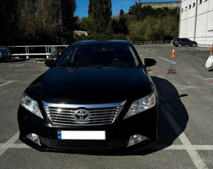 Черный Тойота Камри, объемом двигателя 2.5 л и пробегом 128 тыс. км за 15000 $, фото 1 на Automoto.ua