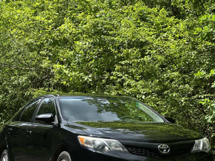 Черный Тойота Камри, объемом двигателя 2.5 л и пробегом 156 тыс. км за 11800 $, фото 1 на Automoto.ua