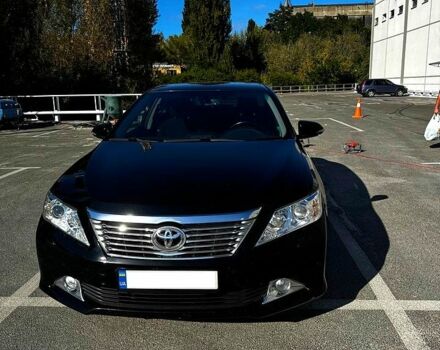 Черный Тойота Камри, объемом двигателя 2.5 л и пробегом 128 тыс. км за 15000 $, фото 1 на Automoto.ua
