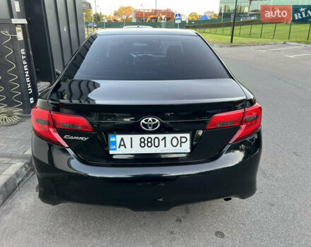 Черный Тойота Камри, объемом двигателя 2.49 л и пробегом 280 тыс. км за 8850 $, фото 1 на Automoto.ua