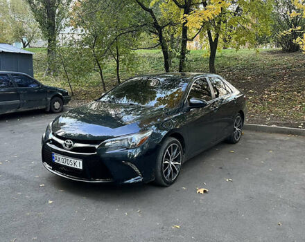 Черный Тойота Камри, объемом двигателя 2.49 л и пробегом 155 тыс. км за 12700 $, фото 1 на Automoto.ua