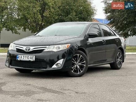 Черный Тойота Камри, объемом двигателя 2.49 л и пробегом 220 тыс. км за 12800 $, фото 1 на Automoto.ua