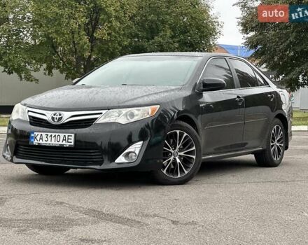 Черный Тойота Камри, объемом двигателя 2.49 л и пробегом 220 тыс. км за 12800 $, фото 1 на Automoto.ua
