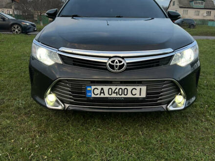 Чорний Тойота Камрі, об'ємом двигуна 2.49 л та пробігом 185 тис. км за 14350 $, фото 1 на Automoto.ua