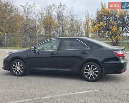 Черный Тойота Камри, объемом двигателя 2.49 л и пробегом 206 тыс. км за 14300 $, фото 1 на Automoto.ua