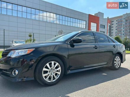 Чорний Тойота Камрі, об'ємом двигуна 2.5 л та пробігом 202 тис. км за 13000 $, фото 1 на Automoto.ua