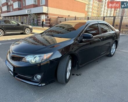 Черный Тойота Камри, объемом двигателя 2.5 л и пробегом 251 тыс. км за 12500 $, фото 1 на Automoto.ua