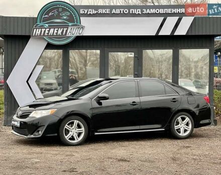 Черный Тойота Камри, объемом двигателя 2.49 л и пробегом 159 тыс. км за 13700 $, фото 1 на Automoto.ua