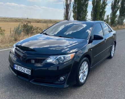 Черный Тойота Камри, объемом двигателя 2.5 л и пробегом 120 тыс. км за 12650 $, фото 1 на Automoto.ua