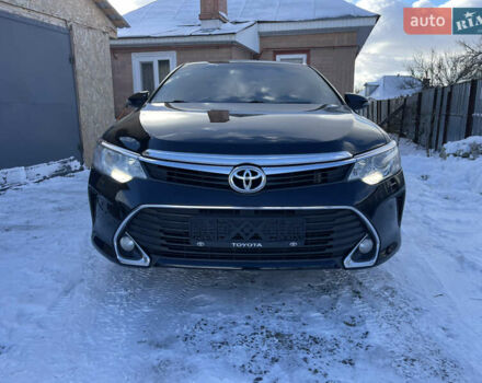 Черный Тойота Камри, объемом двигателя 2.5 л и пробегом 188 тыс. км за 14750 $, фото 1 на Automoto.ua