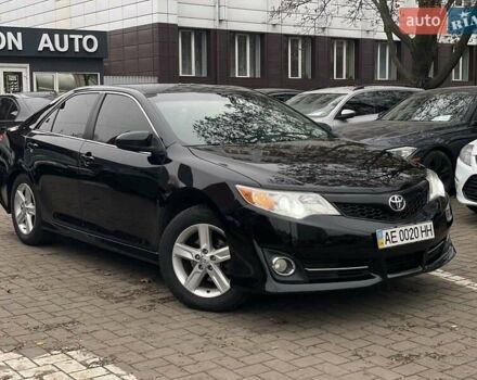 Черный Тойота Камри, объемом двигателя 2.49 л и пробегом 210 тыс. км за 12300 $, фото 1 на Automoto.ua