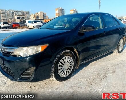 Черный Тойота Камри, объемом двигателя 2.5 л и пробегом 255 тыс. км за 8900 $, фото 1 на Automoto.ua