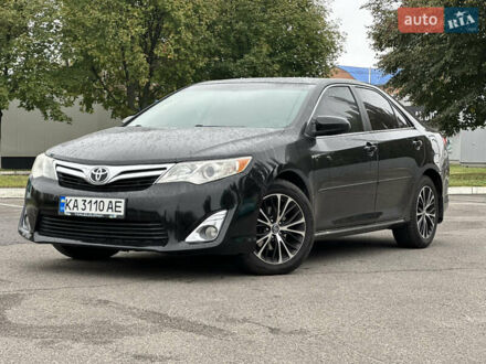 Черный Тойота Камри, объемом двигателя 2.49 л и пробегом 220 тыс. км за 10900 $, фото 1 на Automoto.ua