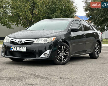 Черный Тойота Камри, объемом двигателя 2.49 л и пробегом 220 тыс. км за 10900 $, фото 1 на Automoto.ua