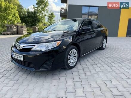 Черный Тойота Камри, объемом двигателя 2.49 л и пробегом 195 тыс. км за 11250 $, фото 1 на Automoto.ua