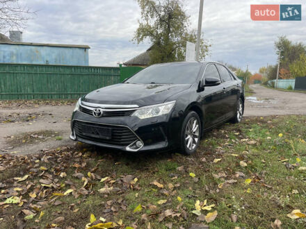 Чорний Тойота Камрі, об'ємом двигуна 2.5 л та пробігом 189 тис. км за 14250 $, фото 1 на Automoto.ua