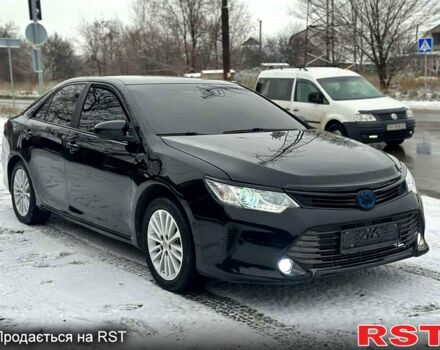 Черный Тойота Камри, объемом двигателя 2.5 л и пробегом 200 тыс. км за 12500 $, фото 1 на Automoto.ua
