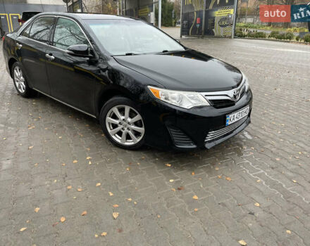 Черный Тойота Камри, объемом двигателя 2.5 л и пробегом 140 тыс. км за 10900 $, фото 1 на Automoto.ua