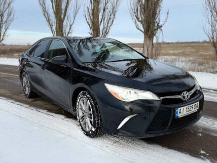 Черный Тойота Камри, объемом двигателя 2.49 л и пробегом 192 тыс. км за 12000 $, фото 1 на Automoto.ua