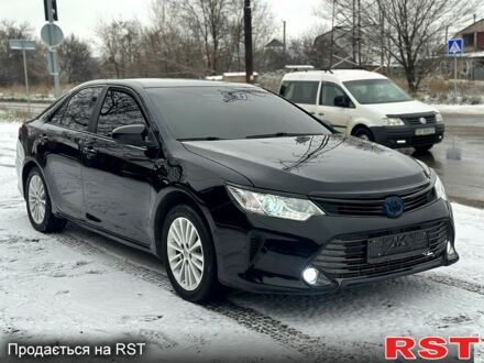 Чорний Тойота Камрі, об'ємом двигуна 2.4 л та пробігом 180 тис. км за 13700 $, фото 1 на Automoto.ua