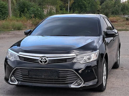 Чорний Тойота Камрі, об'ємом двигуна 2.5 л та пробігом 141 тис. км за 15400 $, фото 1 на Automoto.ua