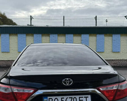 Черный Тойота Камри, объемом двигателя 2.49 л и пробегом 183 тыс. км за 14400 $, фото 1 на Automoto.ua