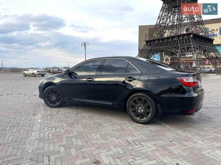 Черный Тойота Камри, объемом двигателя 2.5 л и пробегом 231 тыс. км за 15000 $, фото 1 на Automoto.ua