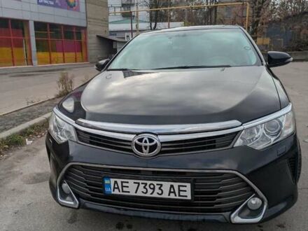 Черный Тойота Камри, объемом двигателя 2.49 л и пробегом 205 тыс. км за 19000 $, фото 1 на Automoto.ua