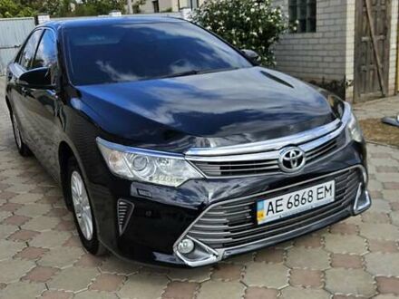 Черный Тойота Камри, объемом двигателя 2.49 л и пробегом 167 тыс. км за 17000 $, фото 1 на Automoto.ua