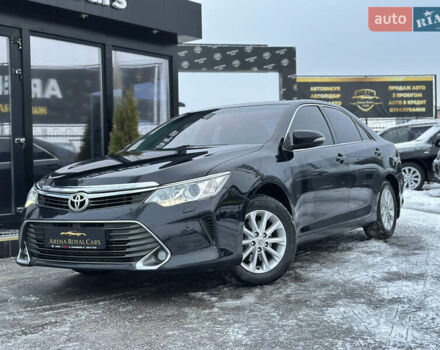 Чорний Тойота Камрі, об'ємом двигуна 2.49 л та пробігом 220 тис. км за 16400 $, фото 1 на Automoto.ua