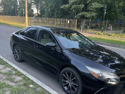 Черный Тойота Камри, объемом двигателя 2.5 л и пробегом 186 тыс. км за 14700 $, фото 1 на Automoto.ua