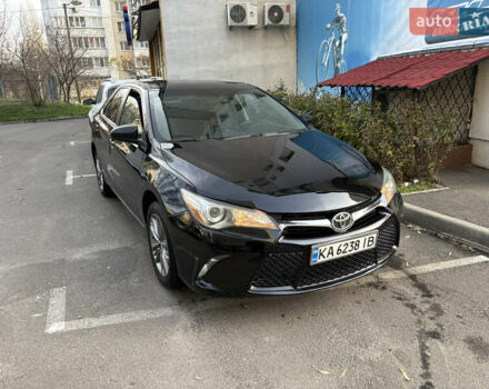 Черный Тойота Камри, объемом двигателя 2.49 л и пробегом 216 тыс. км за 13300 $, фото 1 на Automoto.ua